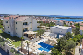 Family friendly apartments with a swimming pool Novalja, Pag - 14275